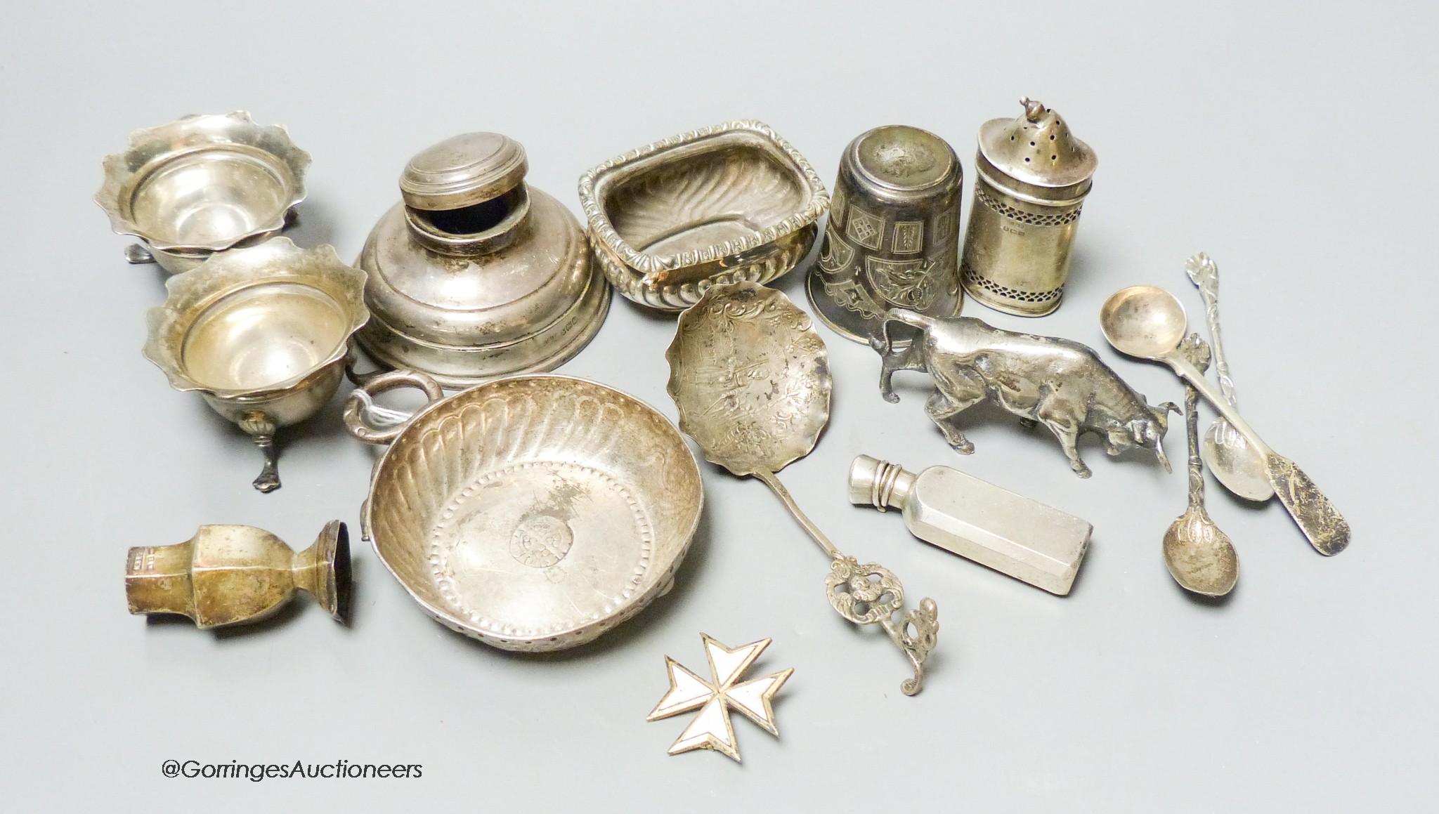 A George V silver taste vin, London, 1913, 10.3cm, a pair of salts and other small items including Russian white metal tot, etc.